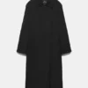 Ελαφρύ παλτό τύπου Καμπαρντίνες σε oversize μέγεθος Ελαφρύ παλτό τύπου Καμπαρντίνες σε oversize μέγεθος