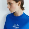 Μπλε T-shirt με γραφικό και σλόγκαν Μπλε T-shirt με γραφικό και σλόγκαν