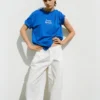 Μπλε T-shirt με γραφικό και σλόγκαν Μπλε T-shirt με γραφικό και σλόγκαν