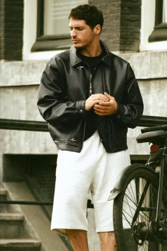 Μπουφάν από συνθετικό δέρμα με κούμπωμα με πείρους Μπουφάν από συνθετικό δέρμα με κούμπωμα με πείρους