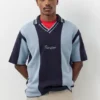 Πλεκτό Polo shirt με κεντημένες ρίγες