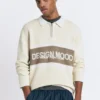 Πλεκτό Polo shirt με μακριά μανίκια και λεπτομέρεια με κείμενο Πλεκτό Polo shirt με μακριά μανίκια και λεπτομέρεια με κείμενο