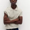 Polo shirt με κοντά μανίκια από πλεκτό ύφασμα