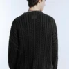 Πουλόβερ με πλεκτό σχέδιο και acid wash Πουλόβερ με πλεκτό σχέδιο και acid wash