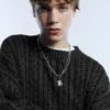 Πουλόβερ με πλεκτό σχέδιο και acid wash Πουλόβερ με πλεκτό σχέδιο και acid wash
