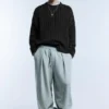 Πουλόβερ με πλεκτό σχέδιο και acid wash Πουλόβερ με πλεκτό σχέδιο και acid wash