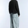 Πουλόβερ με πλεκτό σχέδιο και acid wash Πουλόβερ με πλεκτό σχέδιο και acid wash