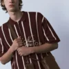 Ριγέ πλεκτό Polo shirt με φερμουάρ