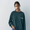 Ριγές T-shirts με μακριά μανίκια και κείμενο Ριγές T-shirts με μακριά μανίκια και κείμενο