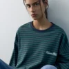 Ριγές T-shirts με μακριά μανίκια και κείμενο Ριγές T-shirts με μακριά μανίκια και κείμενο