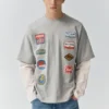 T-shirt με διπλά μανίκια και μπαλώματα T-shirt με διπλά μανίκια και μπαλώματα