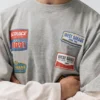 T-shirt με διπλά μανίκια και μπαλώματα T-shirt με διπλά μανίκια και μπαλώματα