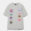 T-shirt με κοντό μανίκι και μπαλώματα T-shirt με κοντό μανίκι και μπαλώματα
